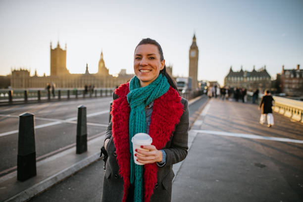 istock Woman having fun on Westminster Bridge 1466728549