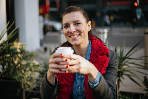 istock Woman having coffee at cafe 1466728653