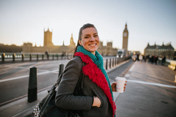istock Woman having fun on Westminster Bridge 1466728671