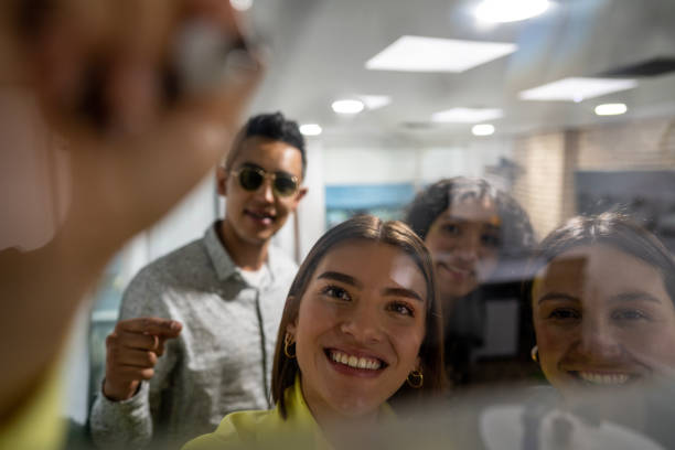 istock Coworkers are talking about work issues in the office 1466728733