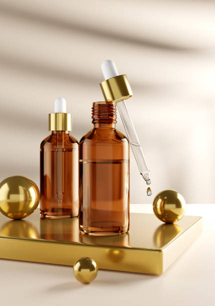 maqueta de botella de vidrio cuentagotas. pipeta de suero osmético con bolas de oro - render de ilustración 3d - perfume bottle scented cosmetics fotografías e imágenes de stock