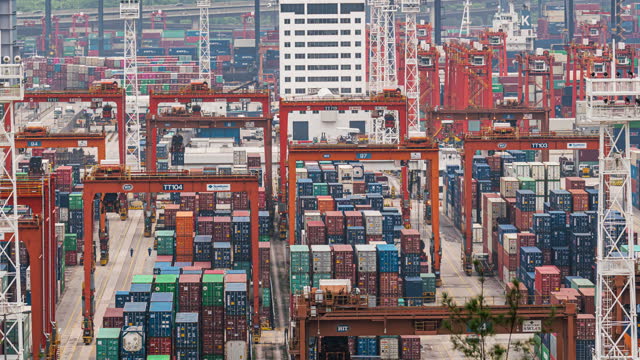Time lapse of Port cargo transshipment hub and container transportation with traffic in Hong Kong