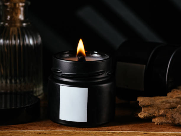 istock The candle is on the shelf, black background 1466740582