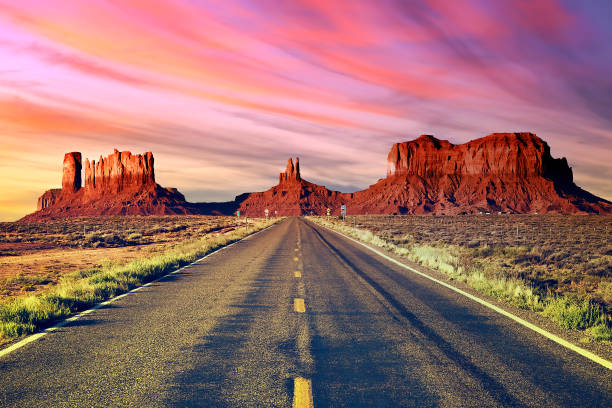 istock Long road at Monument Valley at sunset 1466740735
