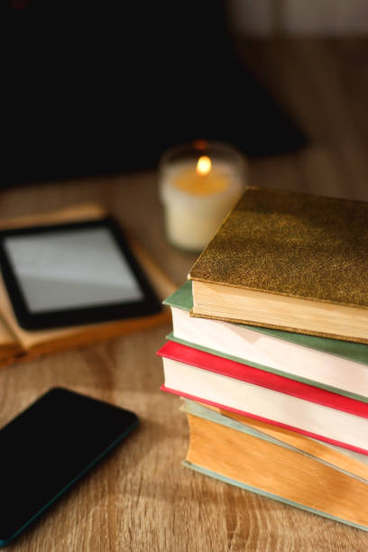 istock Books, Tablet, Glasses, Phone, Laptop and Candle 1466743337