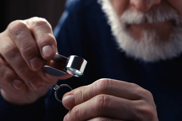 istock Professional jeweler working with ring, closeup view 1466744812