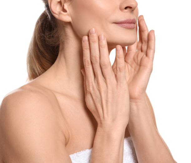 istock Woman massaging her face on white background, closeup 1466744846