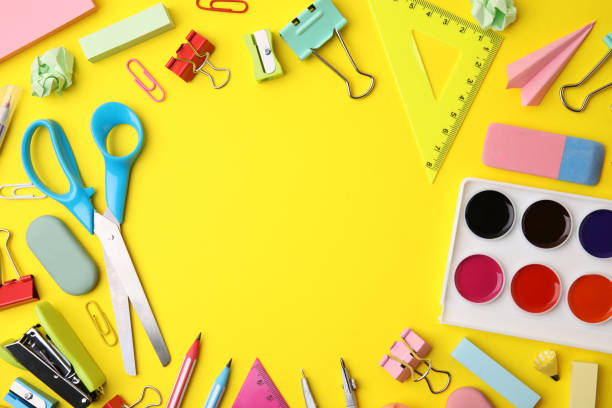 istock Frame made of different school stationery on yellow background, flat lay with space for text. Back to school 1466751030