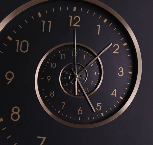 istock Infinity and other time related concepts. Clock hands and twisted hour numbers. Spiral effect 1466751264