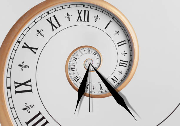 istock Infinity and other time related concepts. Clock hands and twisted hour numbers. Spiral effect 1466751265