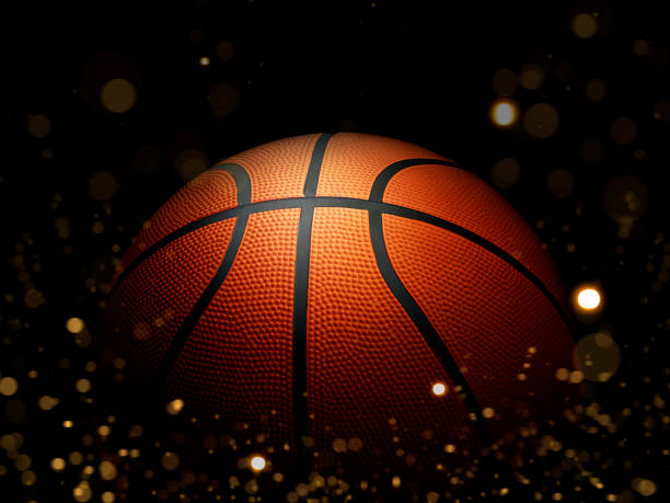 istock Basketball on black background with abstract lights 1466751391