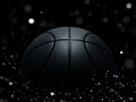 Basketball on black background with abstract lights
