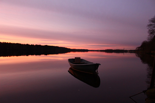 Boat on the river. Sunset. Beautiful background.