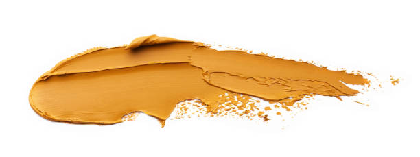 istock Light brown oil paint stroke on white background, top view 1466751914