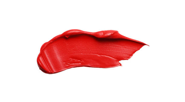 istock Red oil paint stroke on white background, top view 1466751915