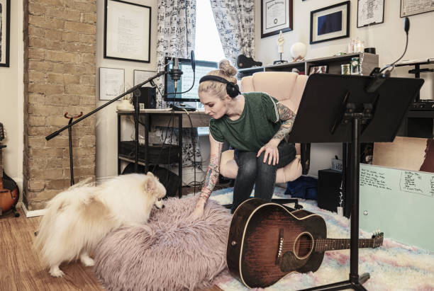 istock Female Musician practising at home 1466752635