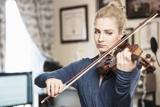 Girl playing music during a music class