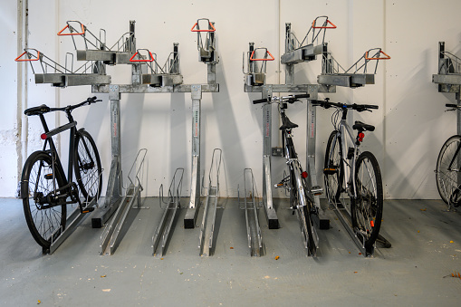 LONDON - November 3, 2020: Bicycles on bike racks inside Inside The Seven Dials Bike Hub, Covent Garden