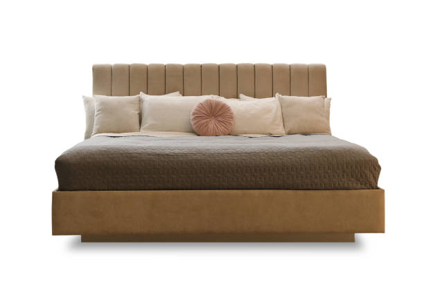 istock Elegant cozy bed with headboard, blanket and pillows on white background 1466757826