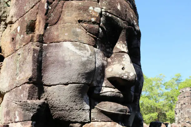 Photo of Bayon temple in Cambodia, faces of unknown deities