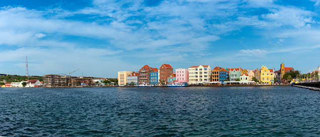 Panoramic photos of the Punta district with shops in the street in front of the entrance to the Willemstad bay. Curacao. Netherlands Antilles. July 27, 2022.