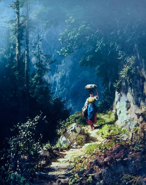 istock Woman carrying a load on her head and a basket in her hand on a path in the mountains 1466760198