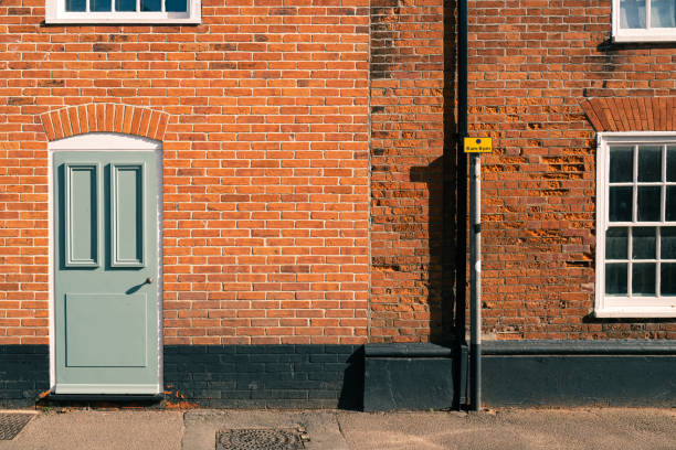 istock Newly fitted door seen in a once old brewery. 1466761674