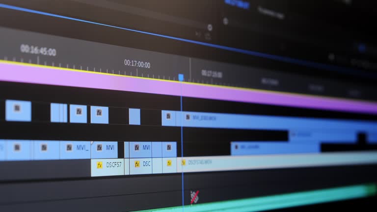 The movie editor highlights, selects, and moves footage in a timeline editing project in a computer program macro mode. time-lapse editing of a TV show, film