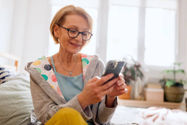 istock Woman reads about Hormone replacement therapy 1466762704