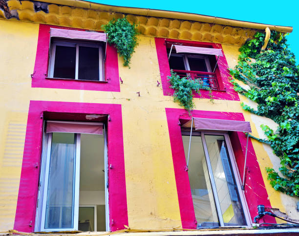 The picture shows a colorful building facade on a blue backgroud. Taken in Nantes, December, 2014