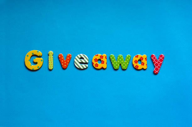 istock colored text  giveaway on blue paper background 1466768441