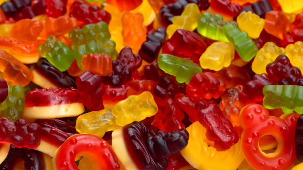istock Assorted colorful gummy candies. Jelly donuts. Jelly bears. 1466769088