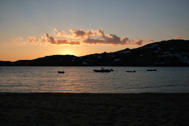istock Sunset at Mylopotas Ios Greece 1466770378