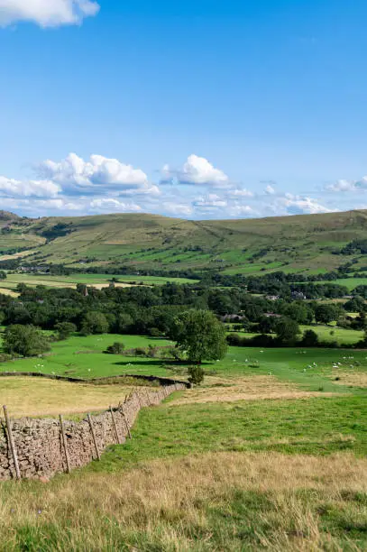 Beautiful field view on Edale village and Mam Tor at Peak District National Park, England, UK. Staycation concept of traveling local