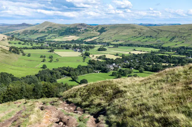 Beautiful field view on Edale village and Mam Tor at Peak District National Park, England, UK. Staycation concept of traveling local