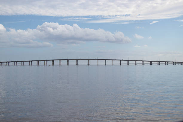 istock Causeway over a river on a cloudy day 1466775515