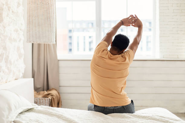 istock Unrecognizable Middle Eastern Man Sitting In Bedroom, Rear View 1466775735