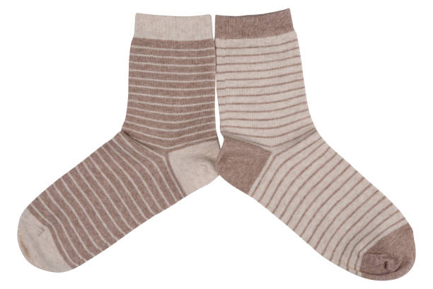 istock Two pairs of socks, with stripes, lie side by side, on a white background 1466778285