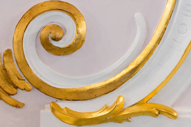 istock White gypsum bas-relief with gold colored details, wall design, rococo 1466780308