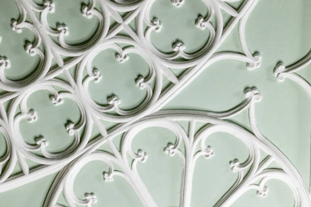 White gypsum bas-relief ceiling design details in Gothic style, classic architecture abstract template