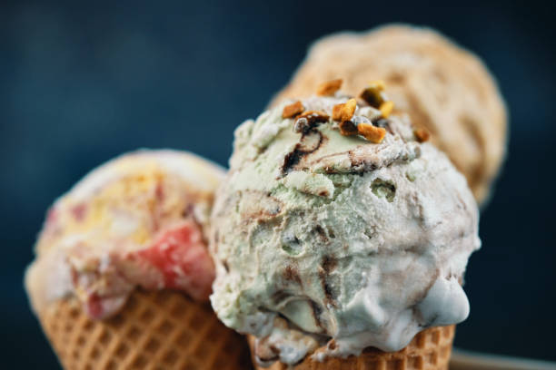 istock Pistachio, Chocolate, Strawberry and Vanilla Ice Cream in a Cone 1466789873