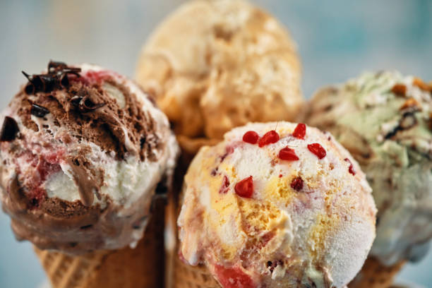 istock Pistachio, Chocolate, Strawberry and Vanilla Ice Cream in a Cone 1466789898