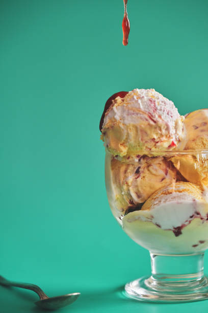 istock Vanilla Ice Cream with Strawberry Topping 1466789907