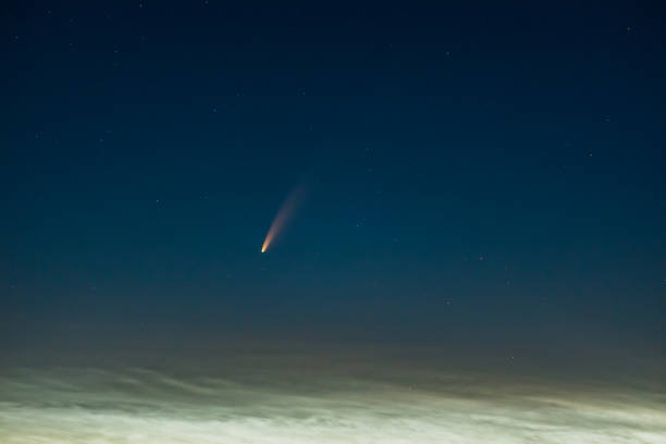 istock Comet Neowise in the starry night sky 1466793376