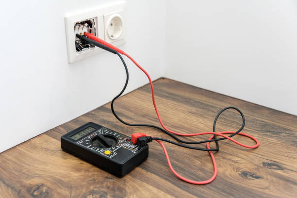 istock the multimeter is on the table. measuring voltage with a tester. 1466793695