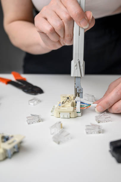 istock Close-up of a network cable laying tool. used to mount the data cable to the data outlet. 1466793774