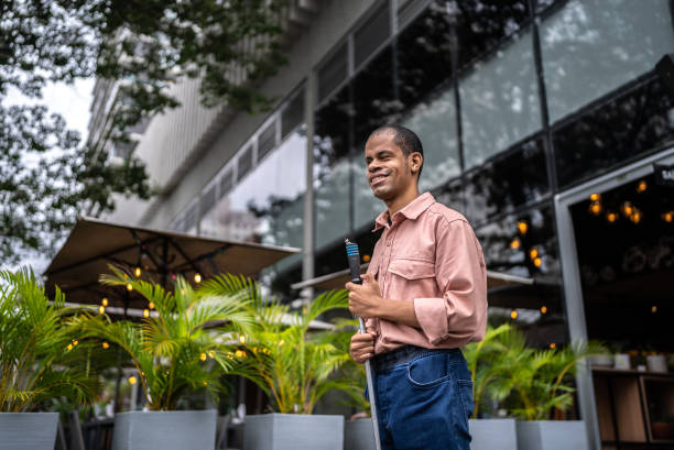 istock Visually impaired man in the street 1466794664