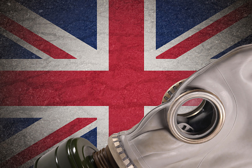 Great Britain, England flag and gas mask, concept of air pollution, radiation, toxic waste