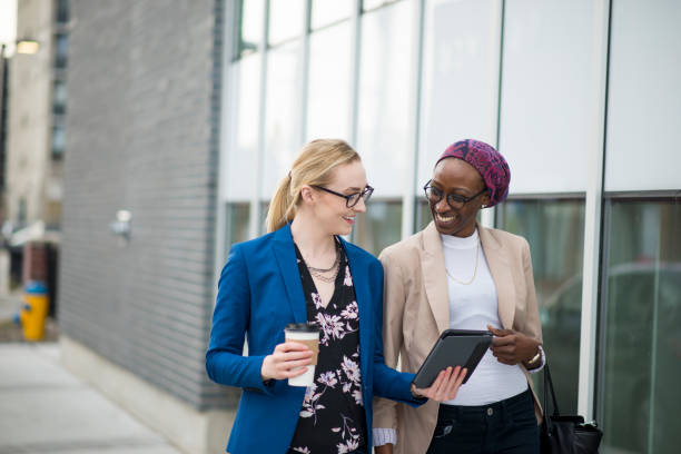 Two Female Business Partners Working on the Go