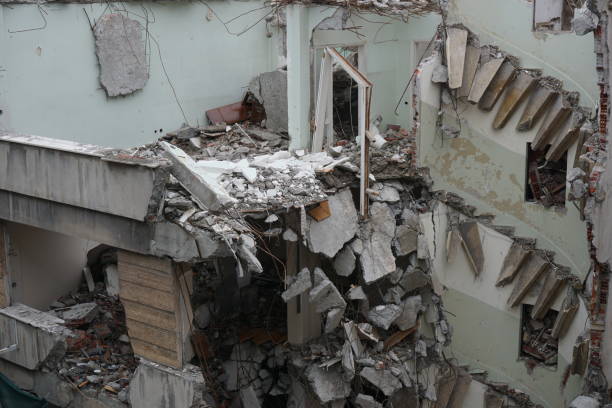 istock remnants of partially destroyed building, debris, demolition 1466811941